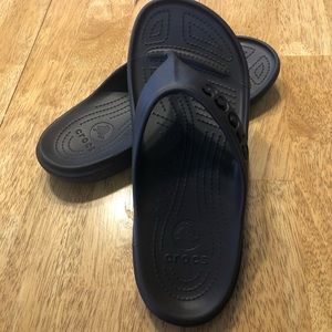 Dark brown Croc flip flops size 10